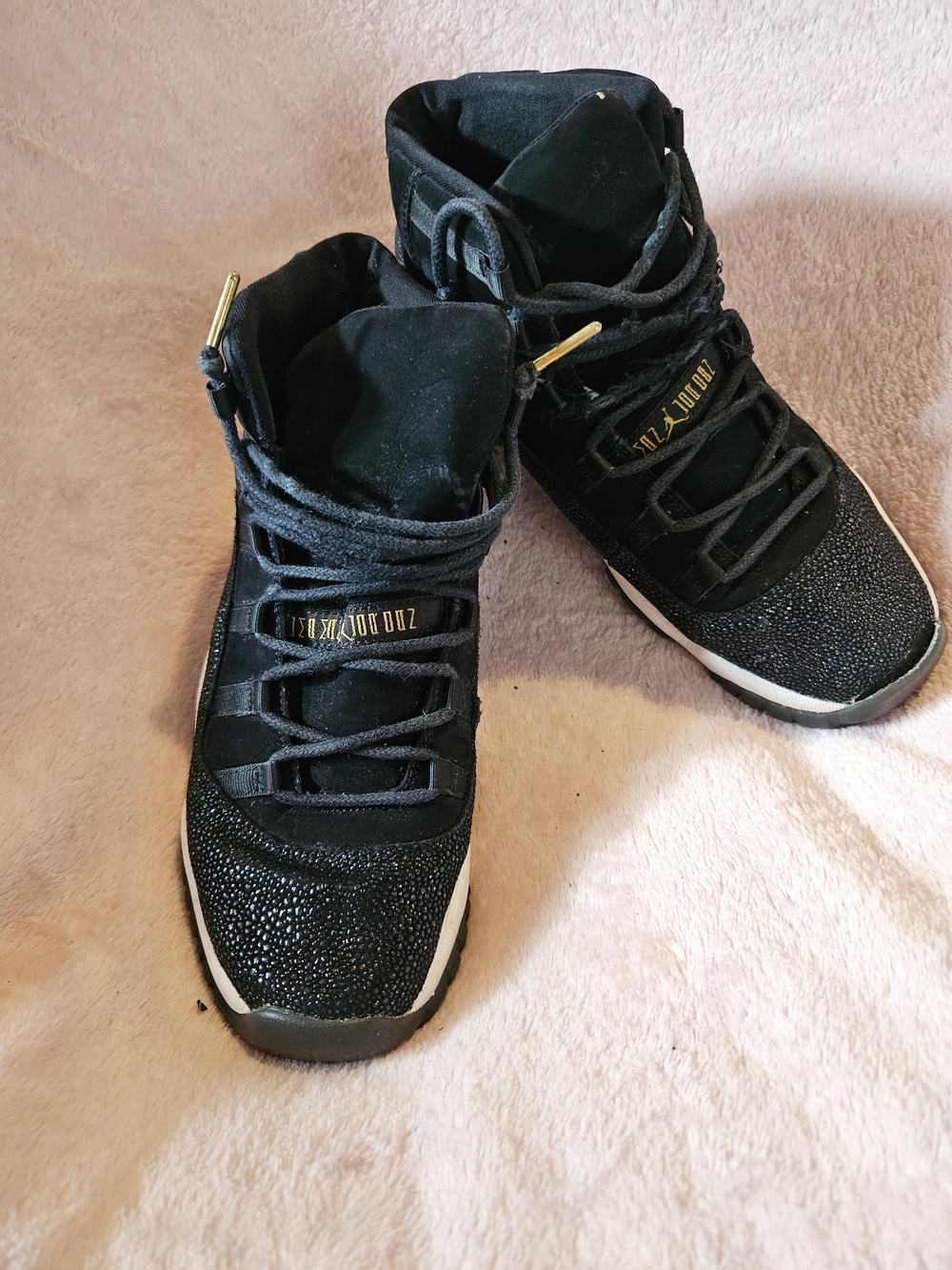 Black High-Top Athletic Sneakers with Gold Accents